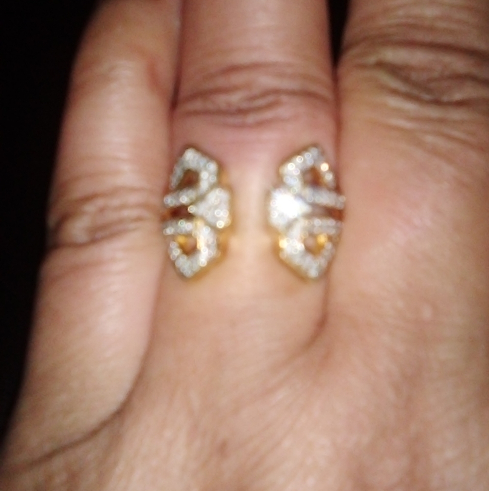 WHITE DIAMOND OPEN RING. .50-1.00CARATS. IN 14KTYELLOWGOLD